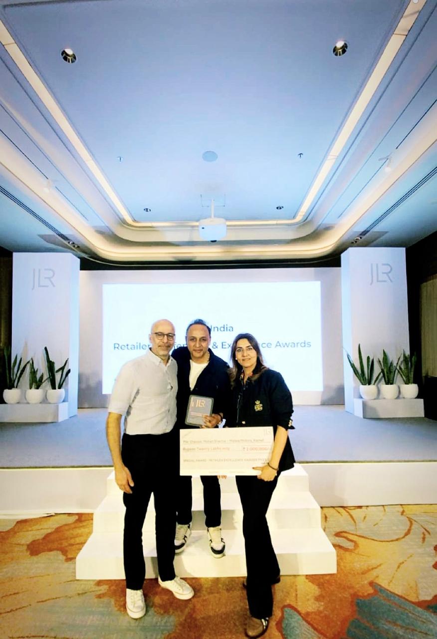 Chander Mohan Sharma with JLR India officials at the Retailer Excellence Awards FY23/24